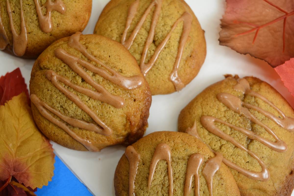 Pumpkin spiced cookies from Cookie Zombie sit among autumn leaves