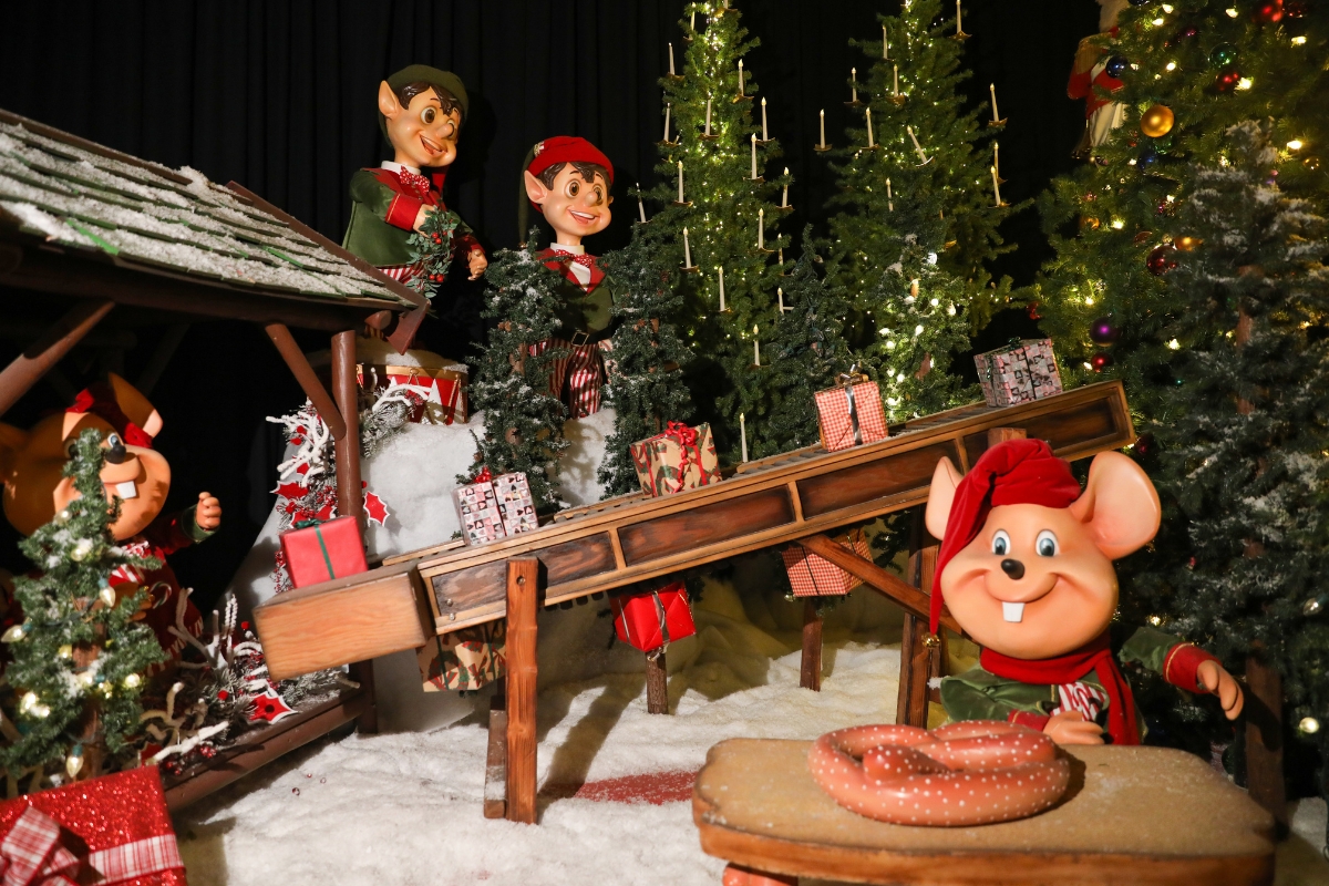 Performers wear holiday costumes