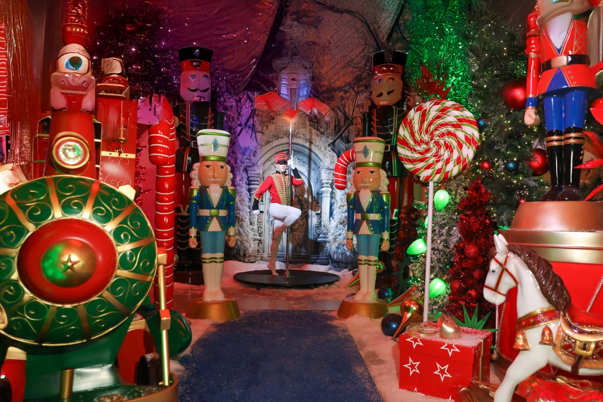 Performers wear holiday costumes