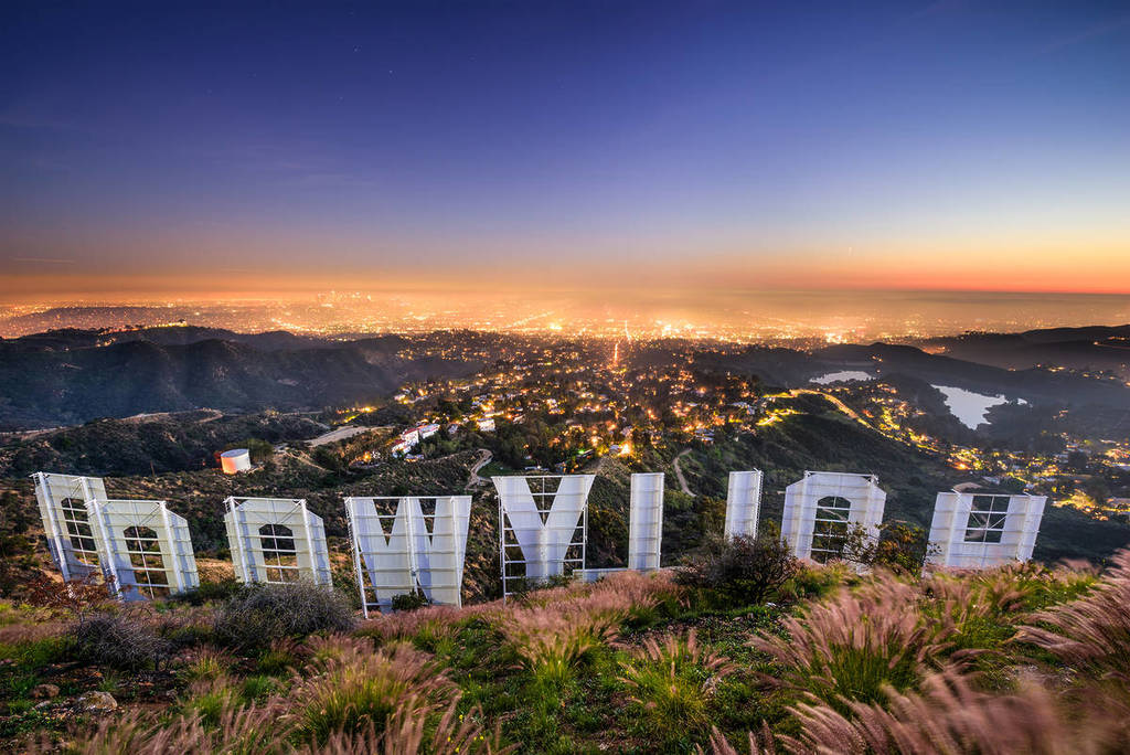 Hollywood sign from behind with view of Los Angeles, USA.