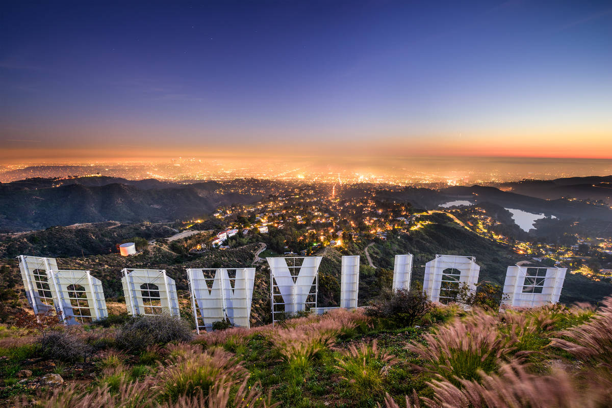 Hollywood sign from behind with view of Los Angeles, USA.