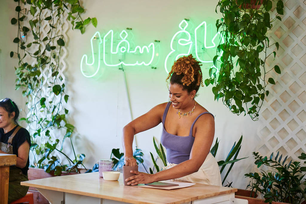 Teacher guiding a ceramics workshop at POT Studio L.A.