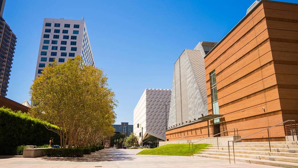The tan brick exterior of The Colburn School, in which sits Zipper Concert Hall.