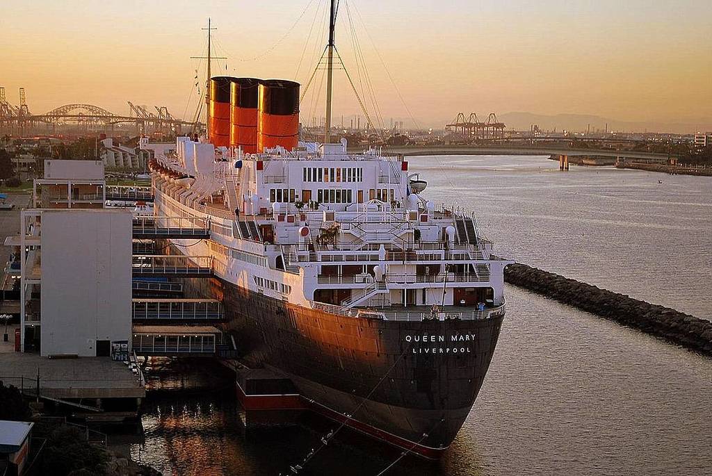 The Queen Mary Ship at sunset, docked on Long Beach.