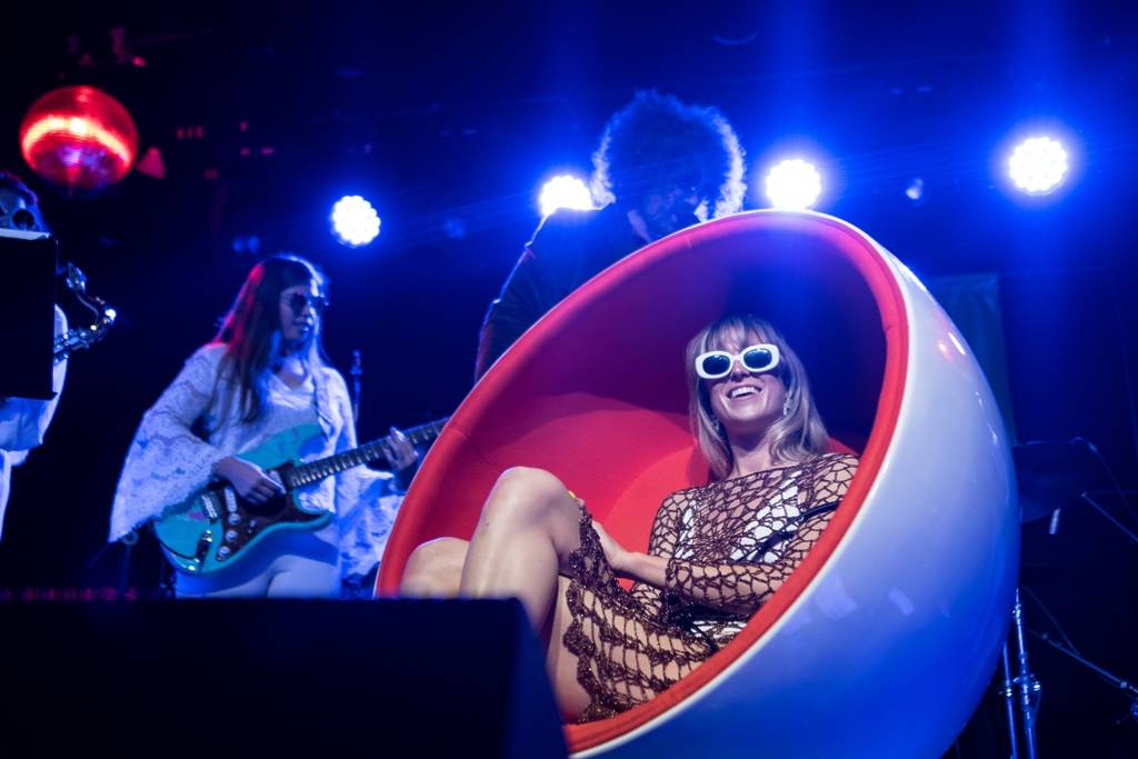 Guests and performers play music and dance at Brassroots