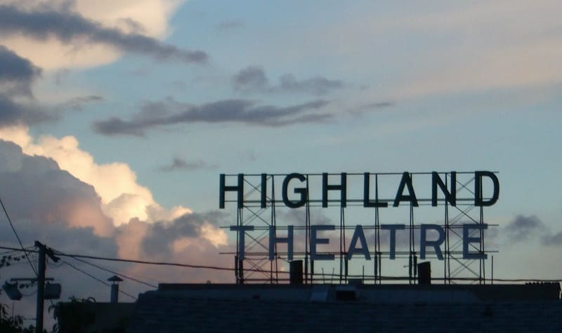 Highland Theatre sign at sunset.