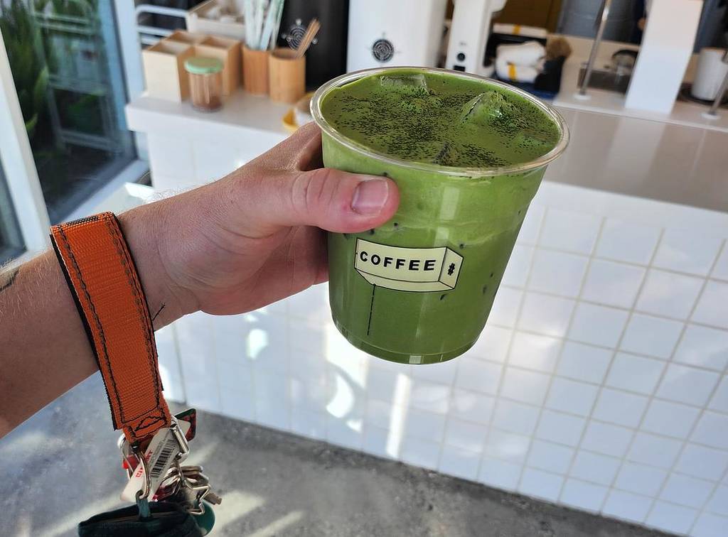 Person holding their Double Matcha from PDA in LA