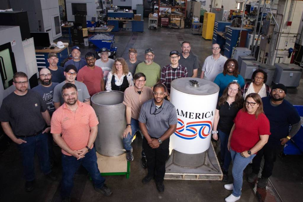 America250 team with time capsule.
