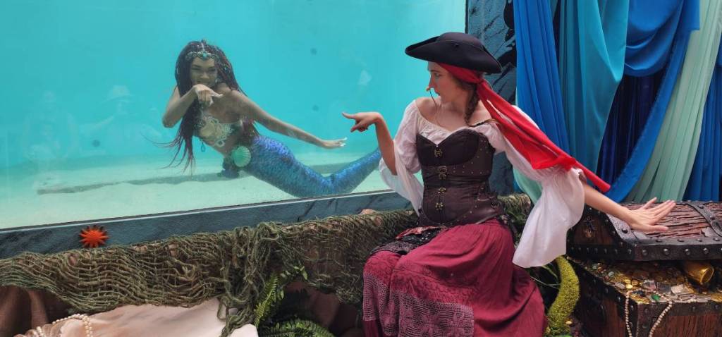 Mermaid and pirate performers at Maritime Festival in Dana Point