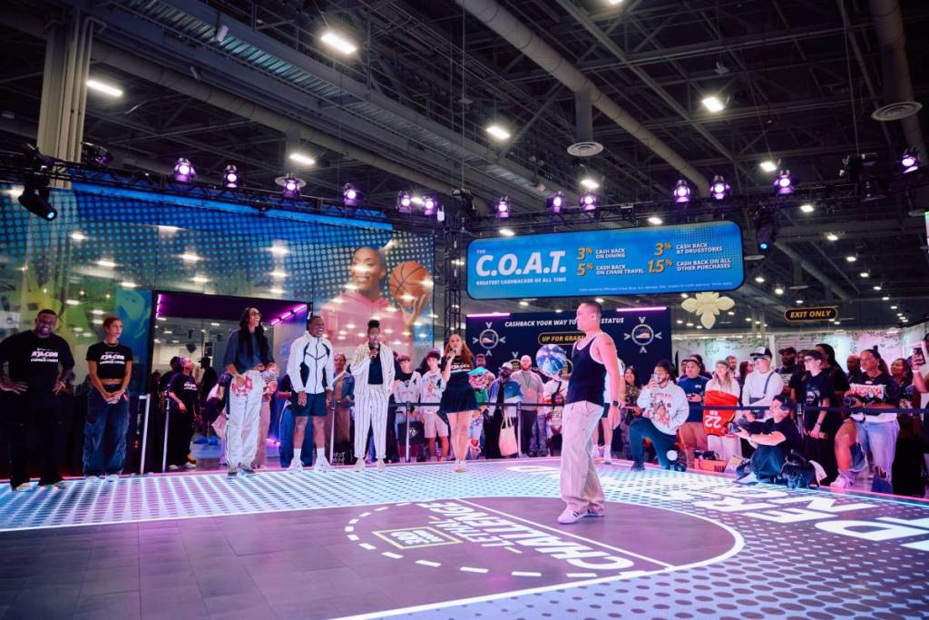 A man standing on the Cashback Courts at Complexcon.