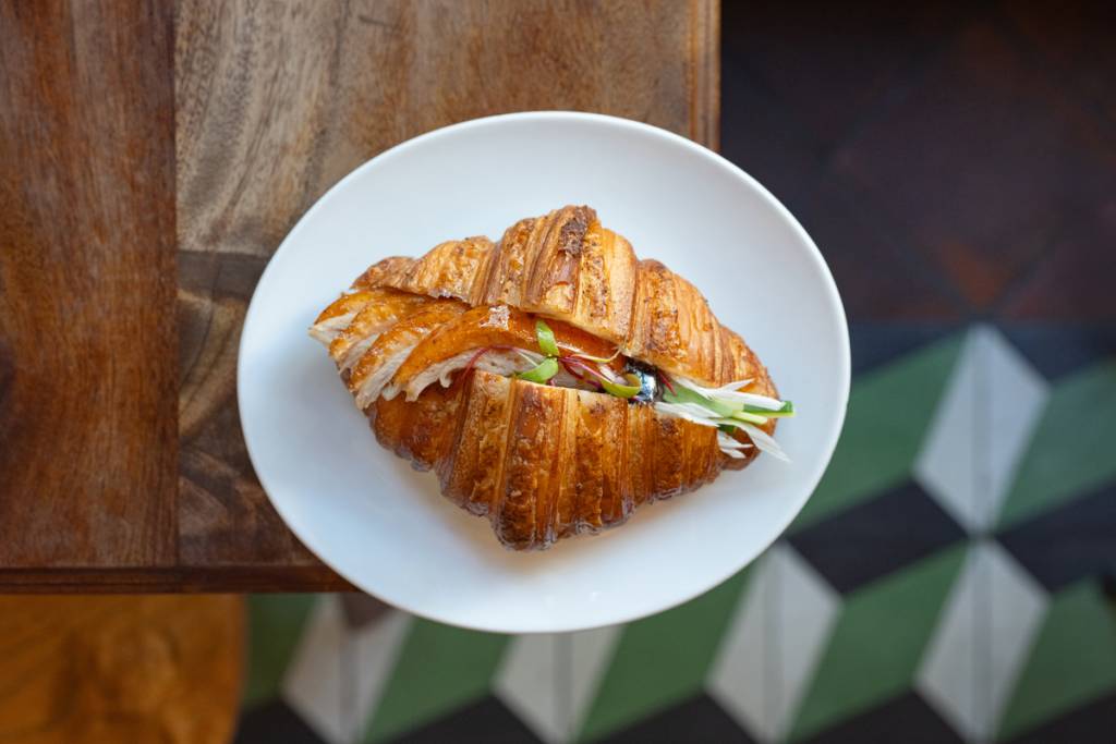 For its 10th anniversary, Michelin-starred Bistro Na’s is rolling out a $14 Peking Duck croissant collab with République and a rare $258 imperial duck