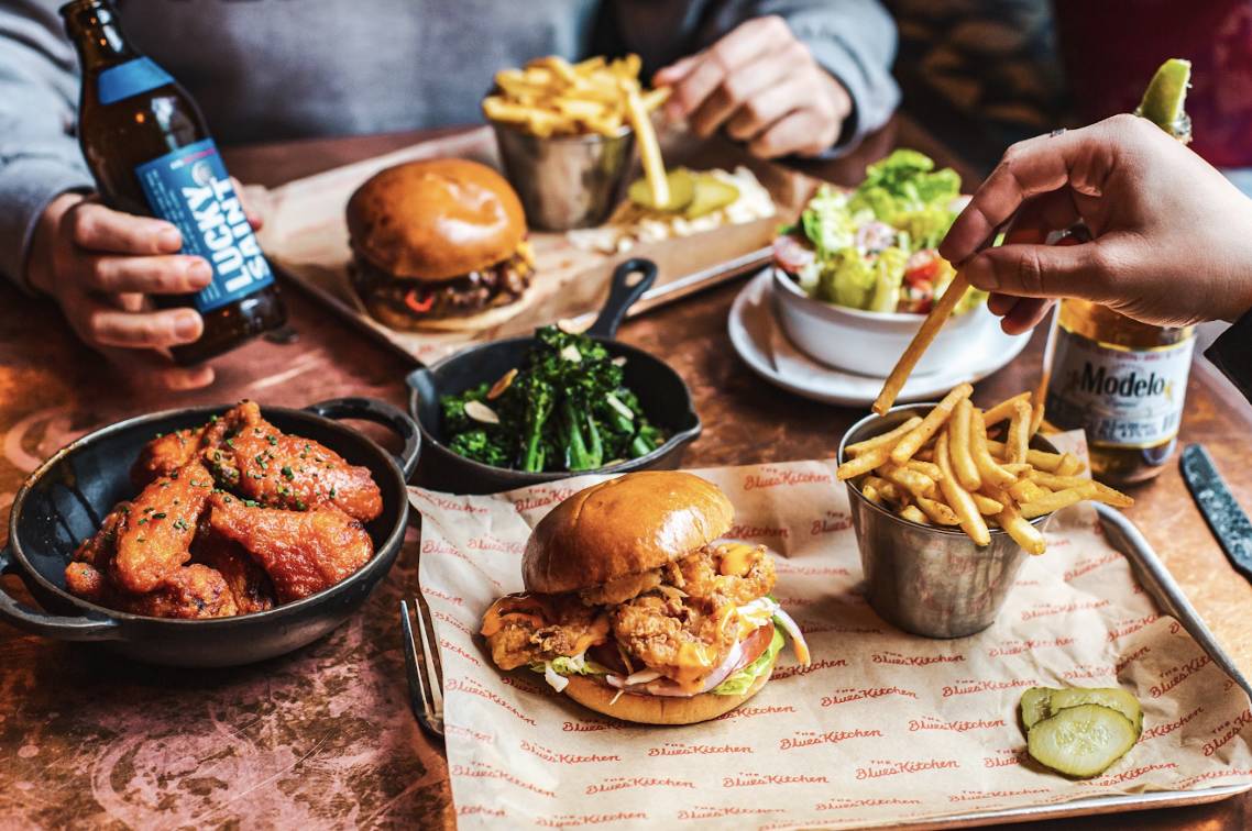 burgers, wings and fries at the blues kitchen manchester
