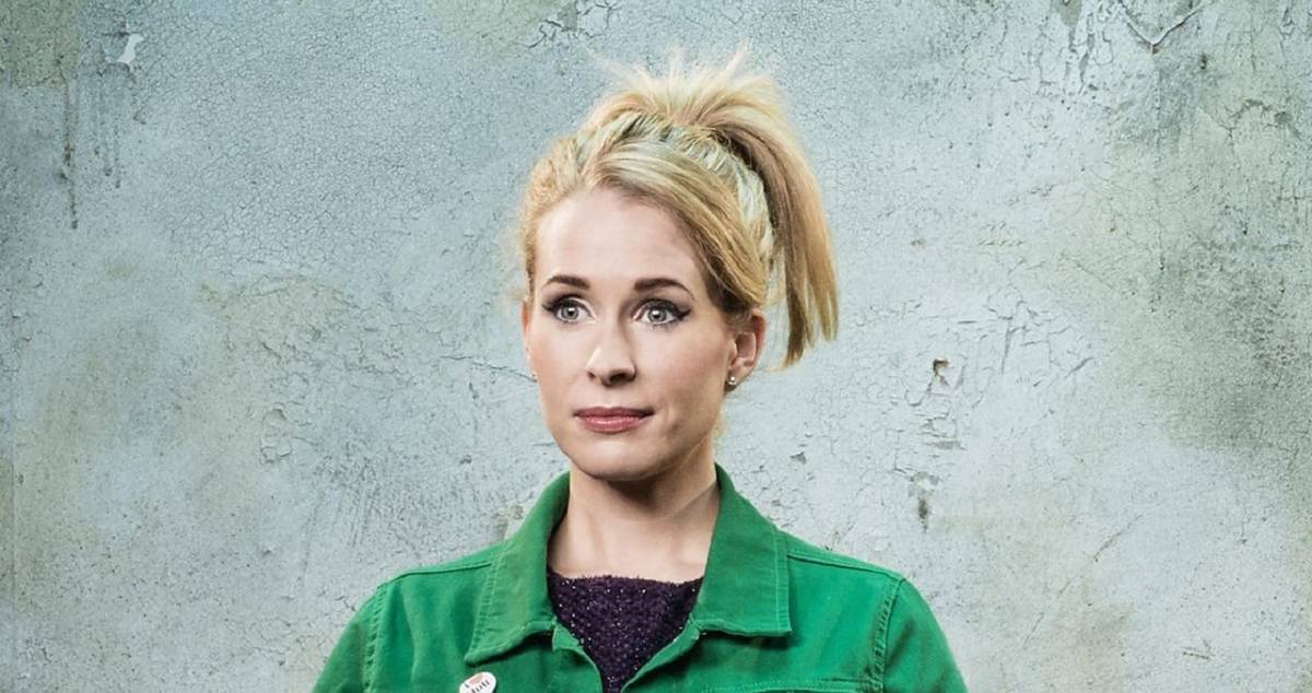 lucy beaumont wearing green jumpsuit