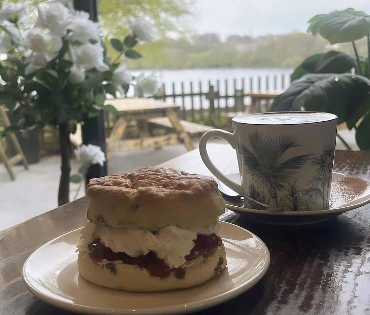 cup of tea and a scone on a table at the rivington
