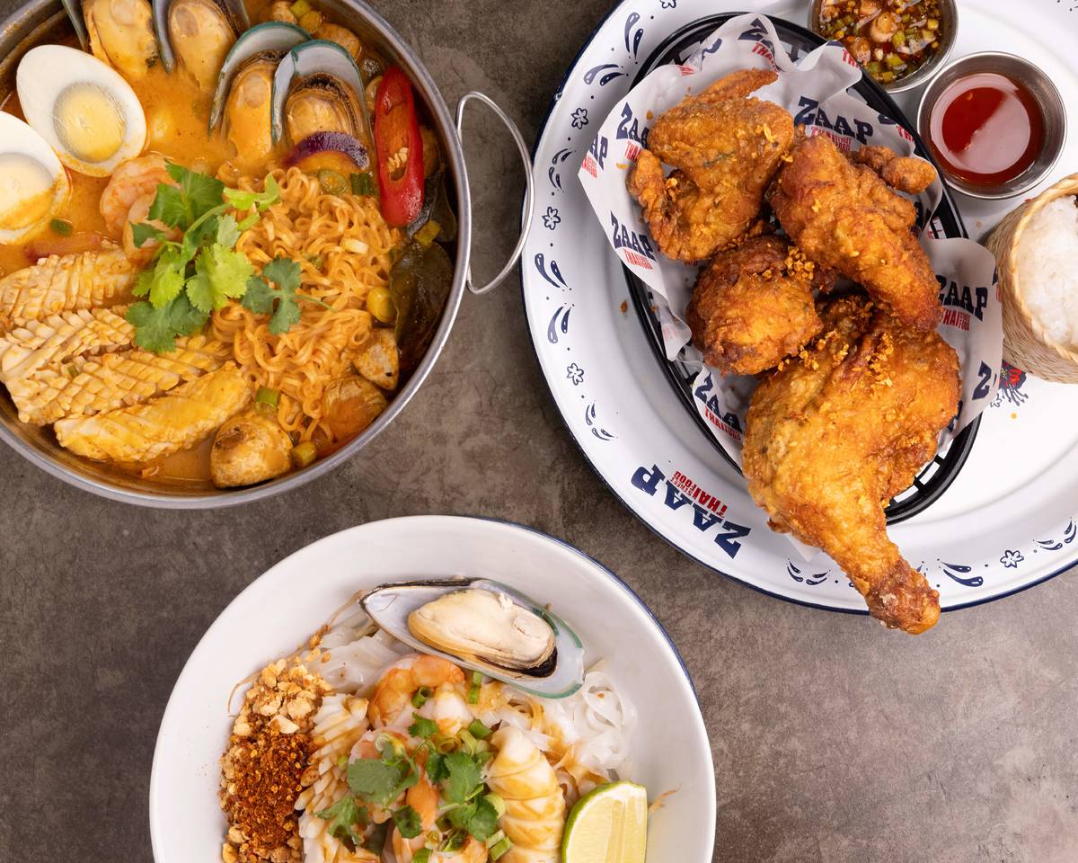 selection of dishes on table at zaap thai manchester