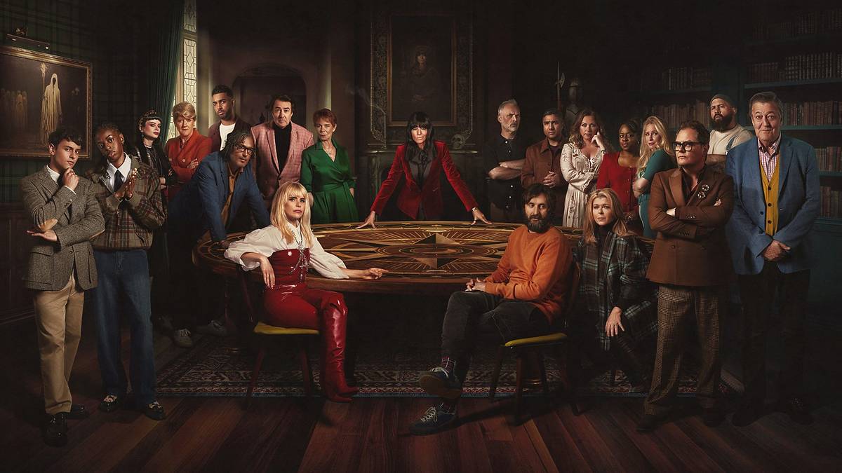 celebrity traitors around table with claudia