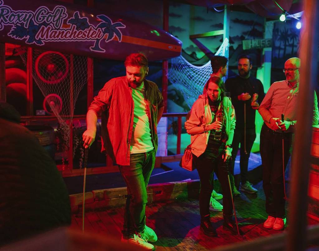 a-group-crazy-golfing-at-roxy-ball-room-manchester