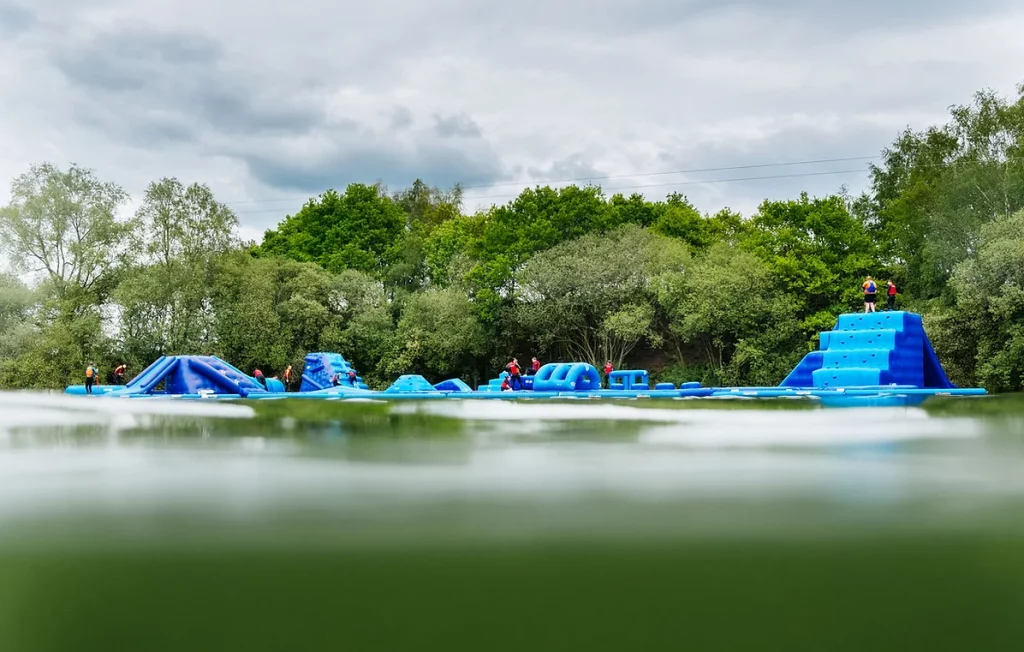wild-shore-blackpool-aqua-park-from-far-away-on-water-with-trees-behind