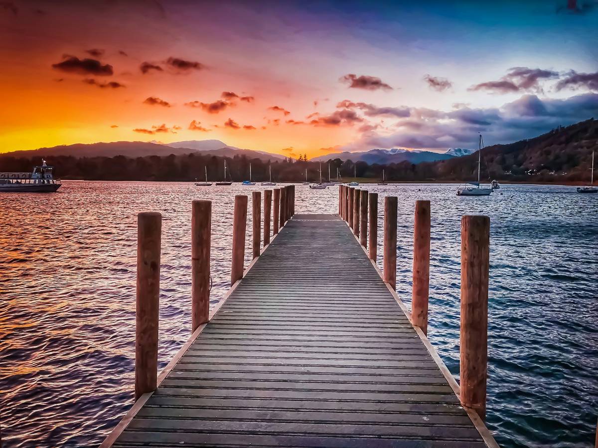 boardwalks at lake windermere at sunset