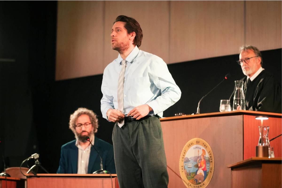 man acts as lawyer giving a speech during the jury experience