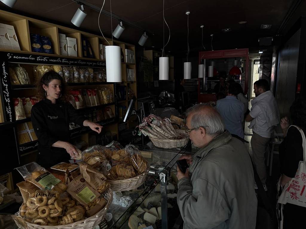 restaurant in Barcelona, Spain in darkness due to power outages in country and Portugal