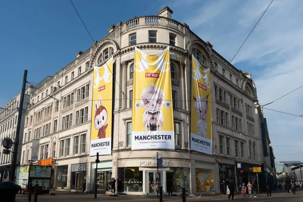 pop mart store manchester exterior with banners