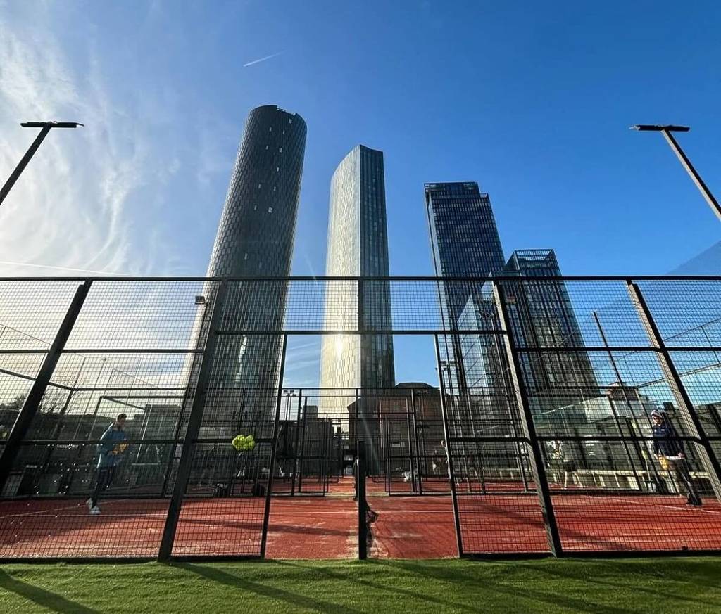 club de padel court in manchester with deansgate square towers in background
