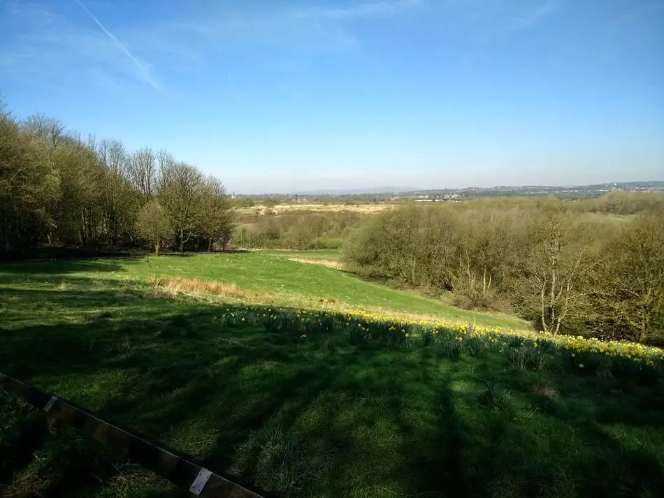 sprinwater park radcliffe bury blue skies green grass and trees