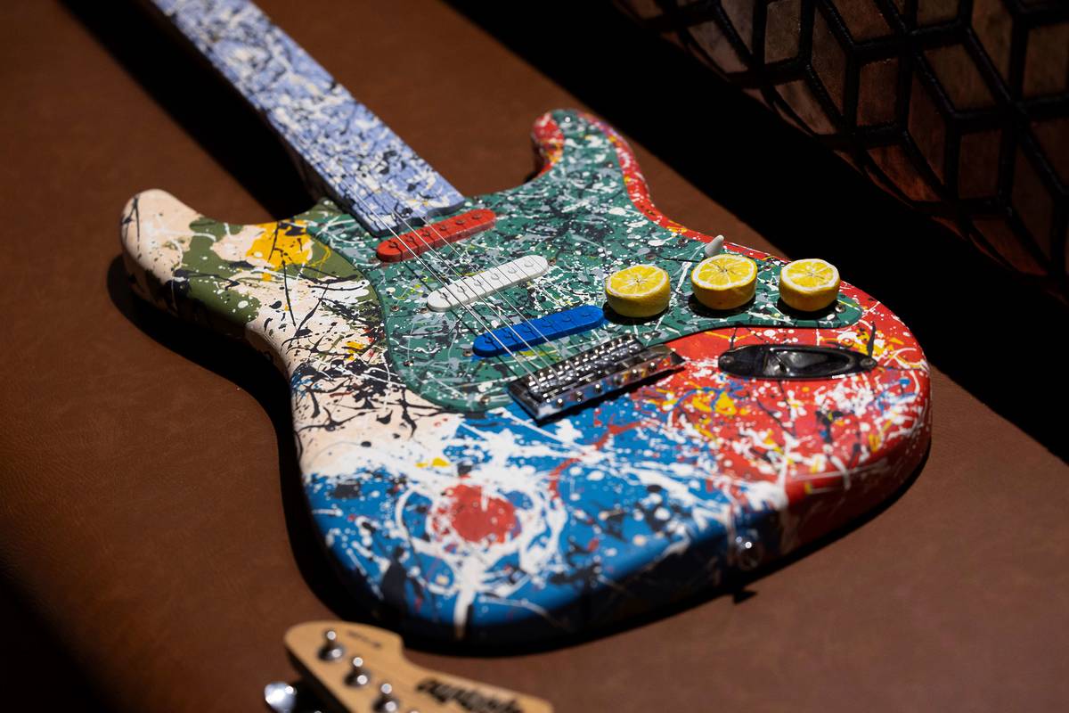 stone roses decorated electric guitar