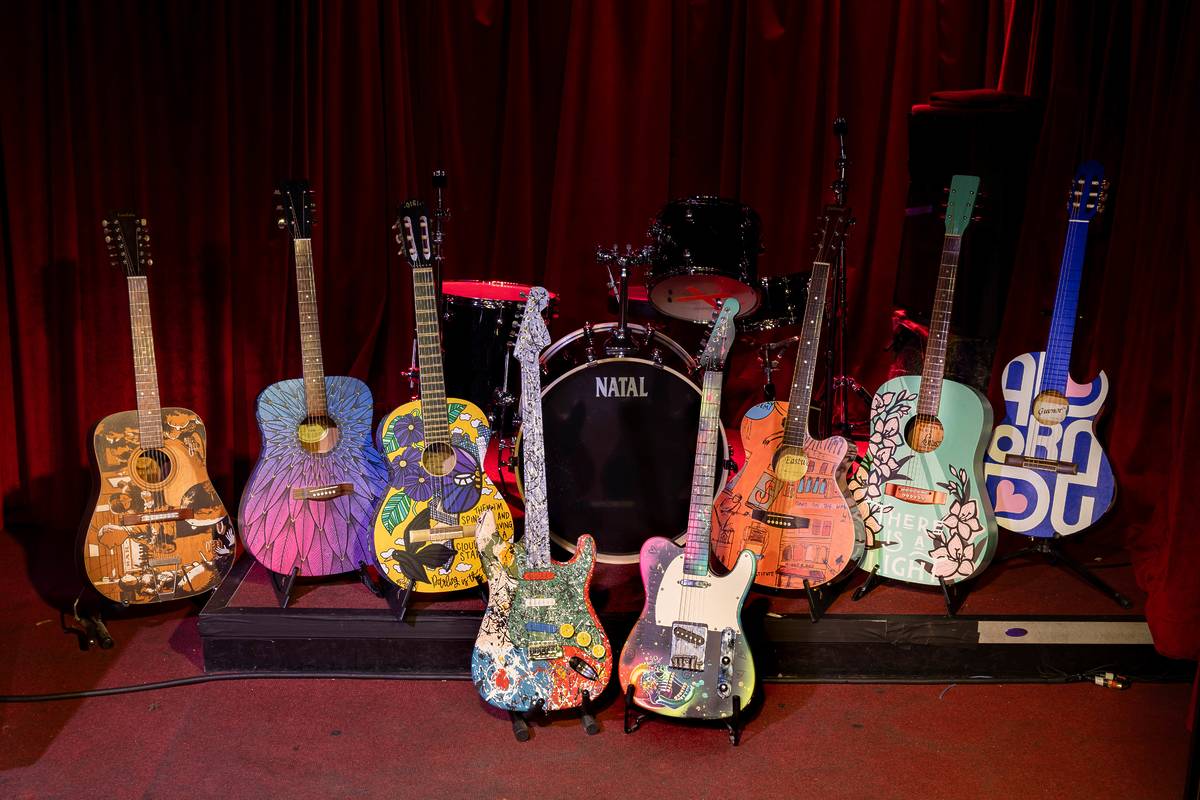 decorated guitars displayed for music for the senses art trail manchester