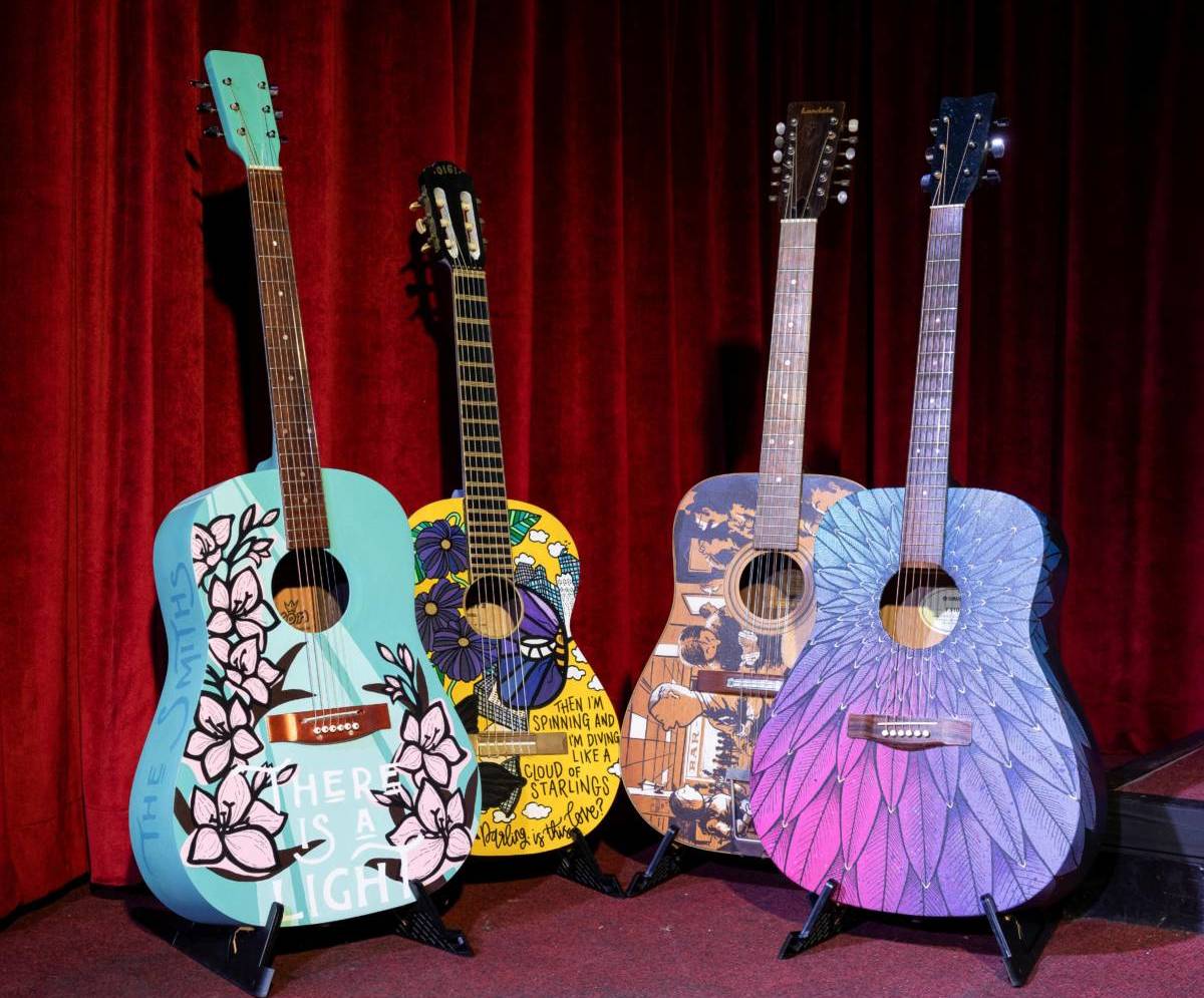 acoustic guitars decorated for music for the senses