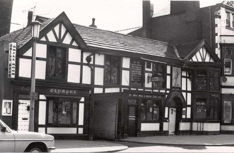 ye olde man and scythe pub black and whote bolton