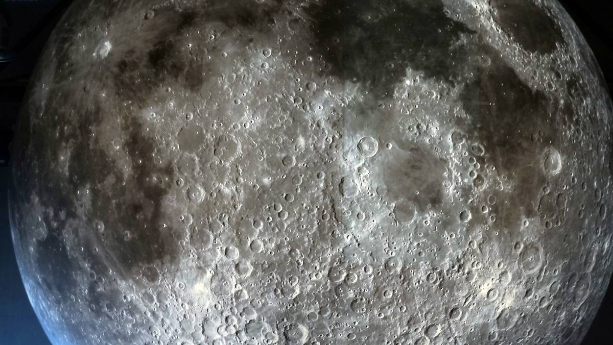 zoom shot of museum of the moon sculpture by luke jerram