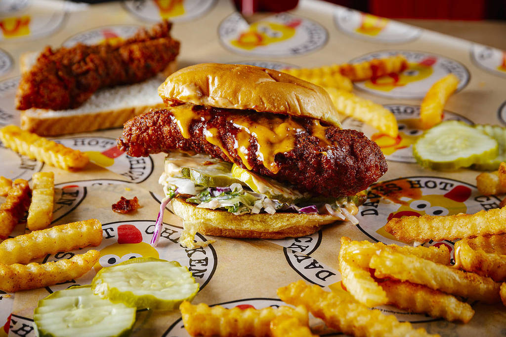 dave's hot chicken selects on tray with pickles and crinkle fries