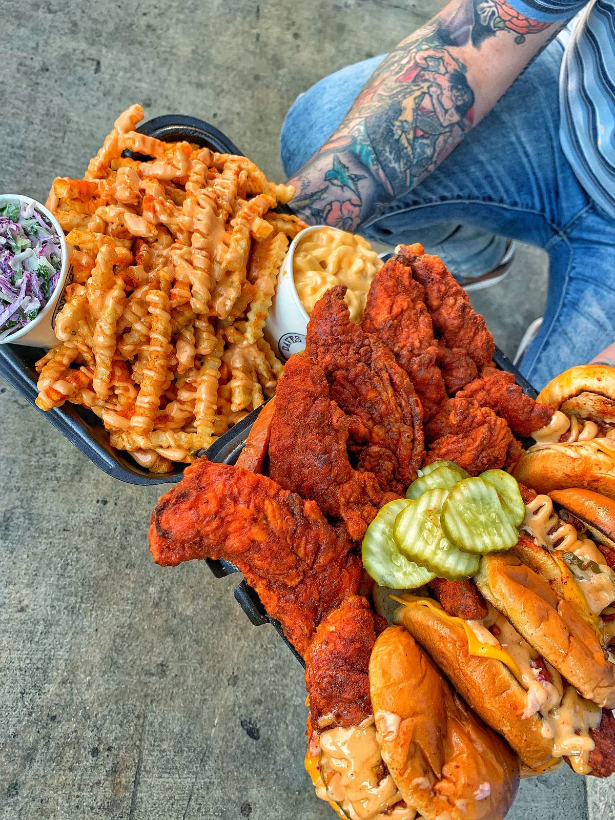 cheese fries and tenders on trays