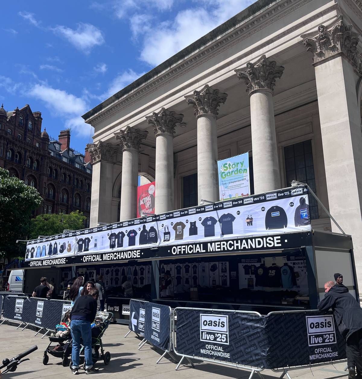 oasis merch stand outside manchester central library