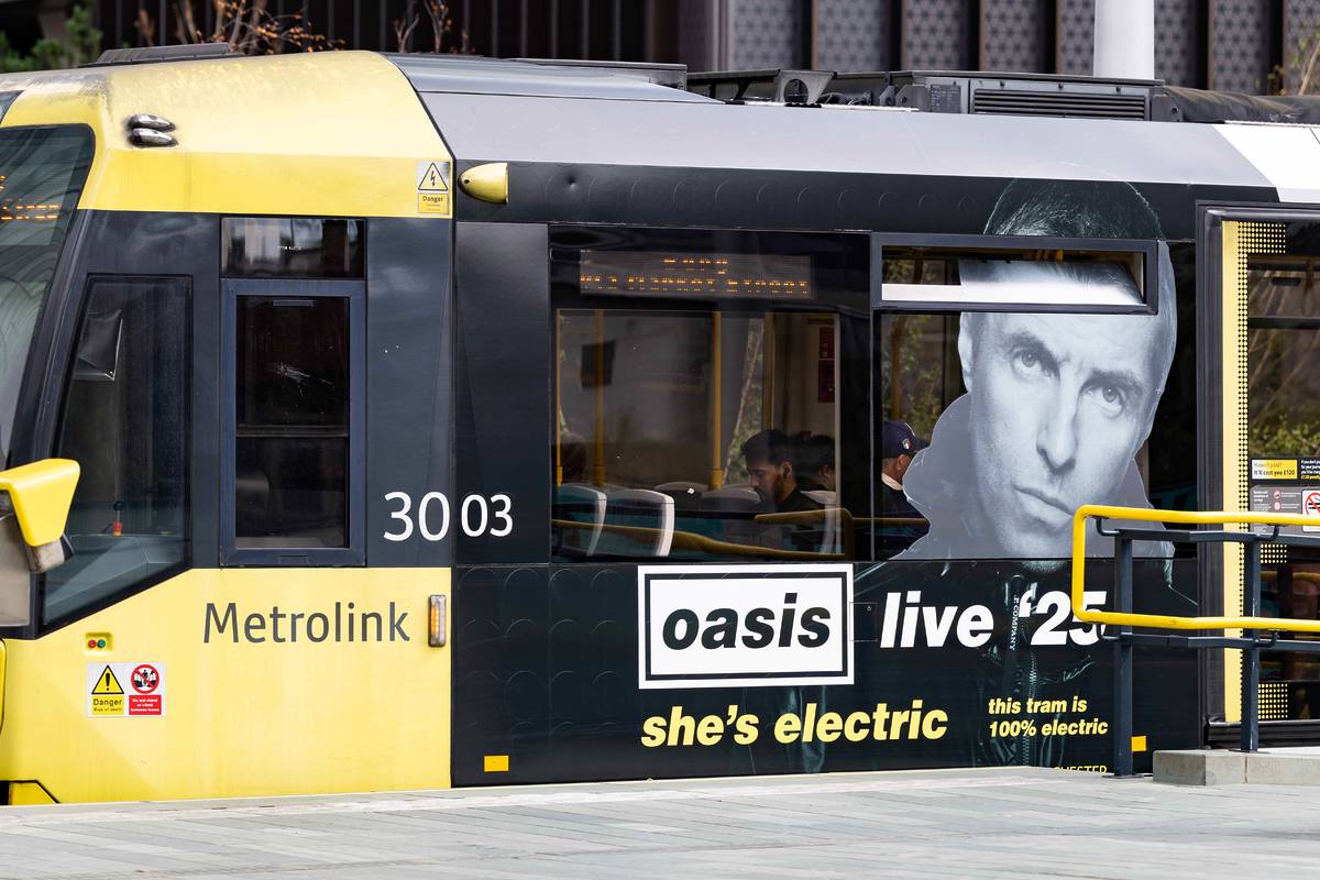 Oasis Manchester Metrolink tram wrap