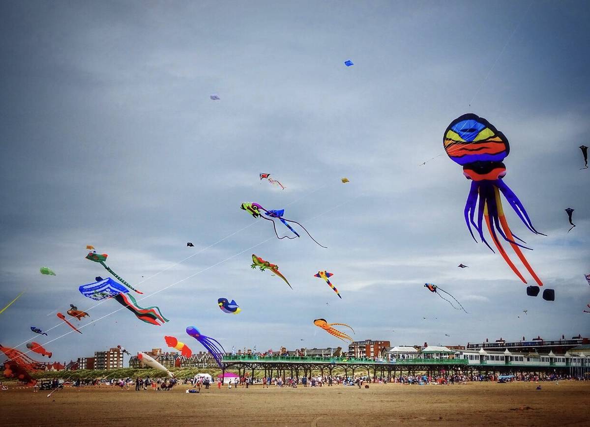 kites flying along st annes beach