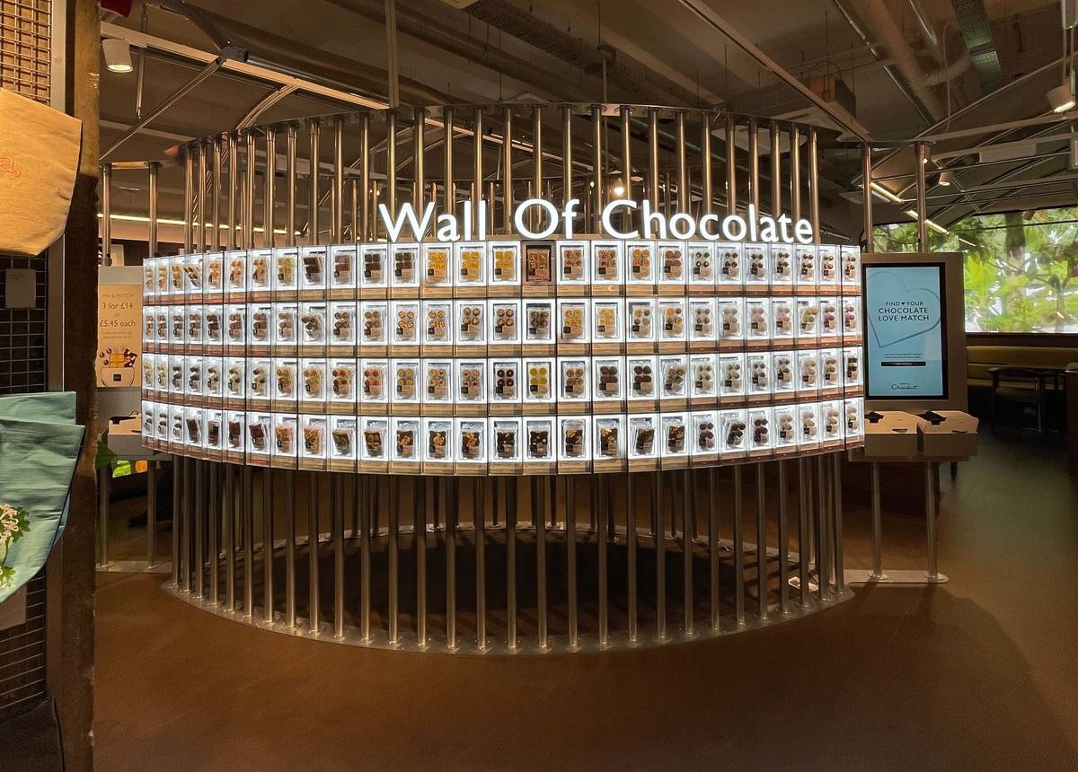 wall of chocolate inside hotel chocolat velvetiser cafe in manchester