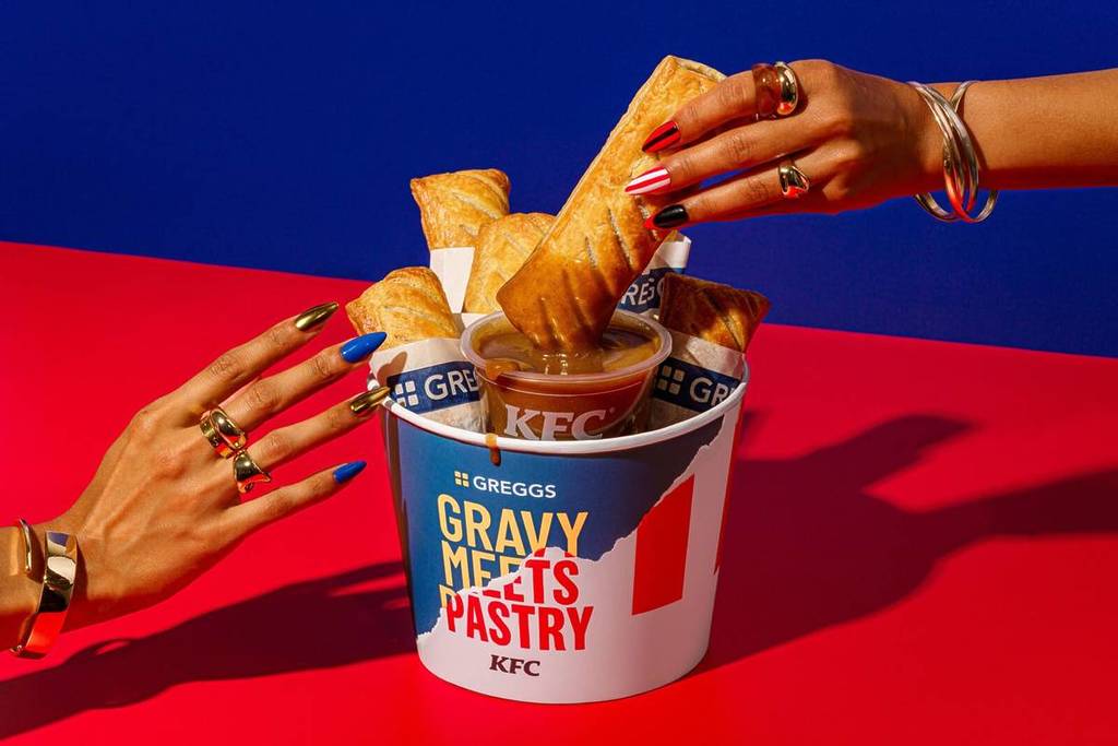 sausage roll being dunked in gravy greggs kfc