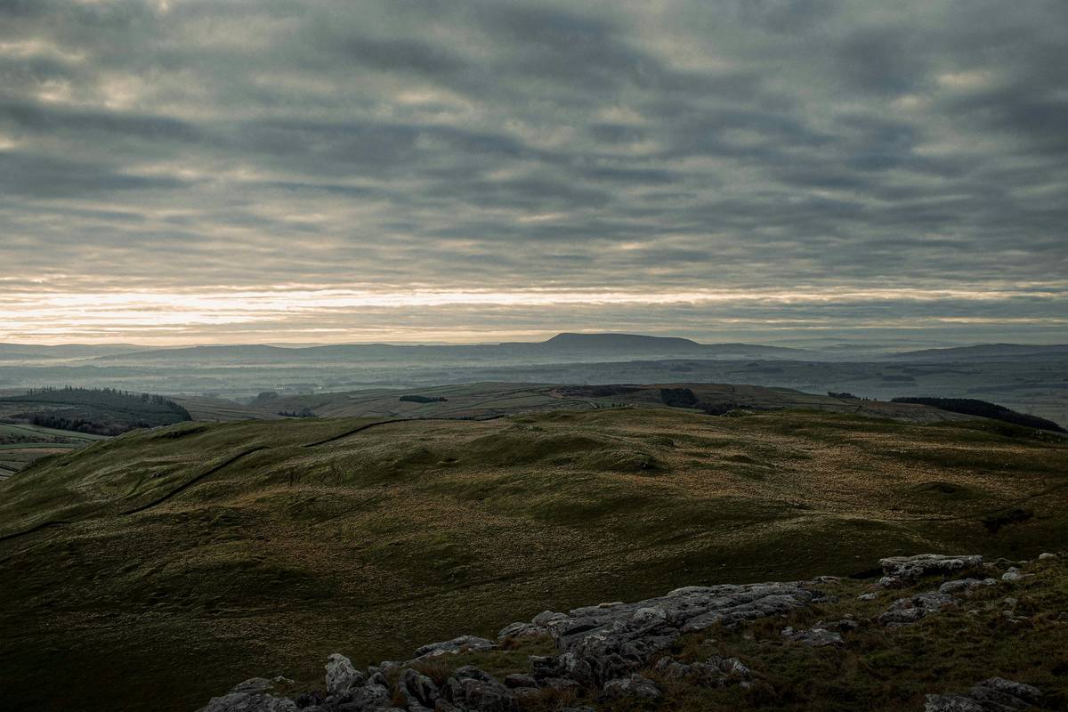 pendle hill from afar grey skies