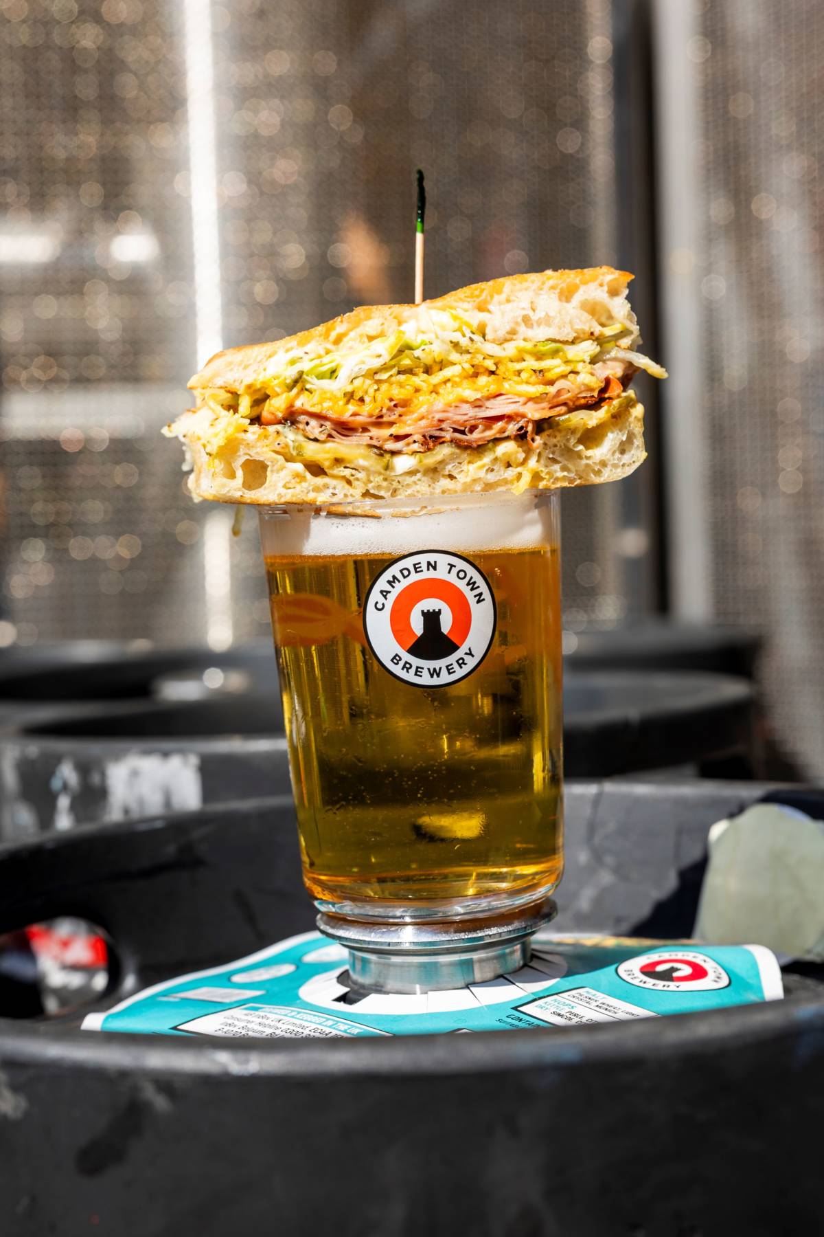 sandwich stacked on top of camden town brewery hells lager