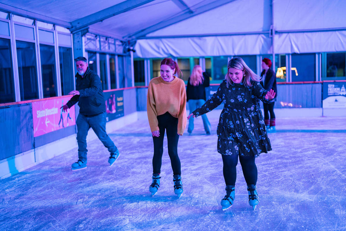 people skating on ice rink