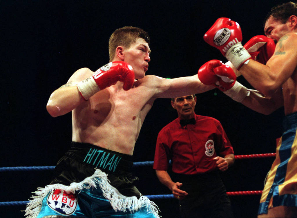 Ricky Hatton of Great Britain connects with a left to the head of John Bailey during their bout for the WBU Light-Welterweight Title at the M.E.N. Arena, Manchester