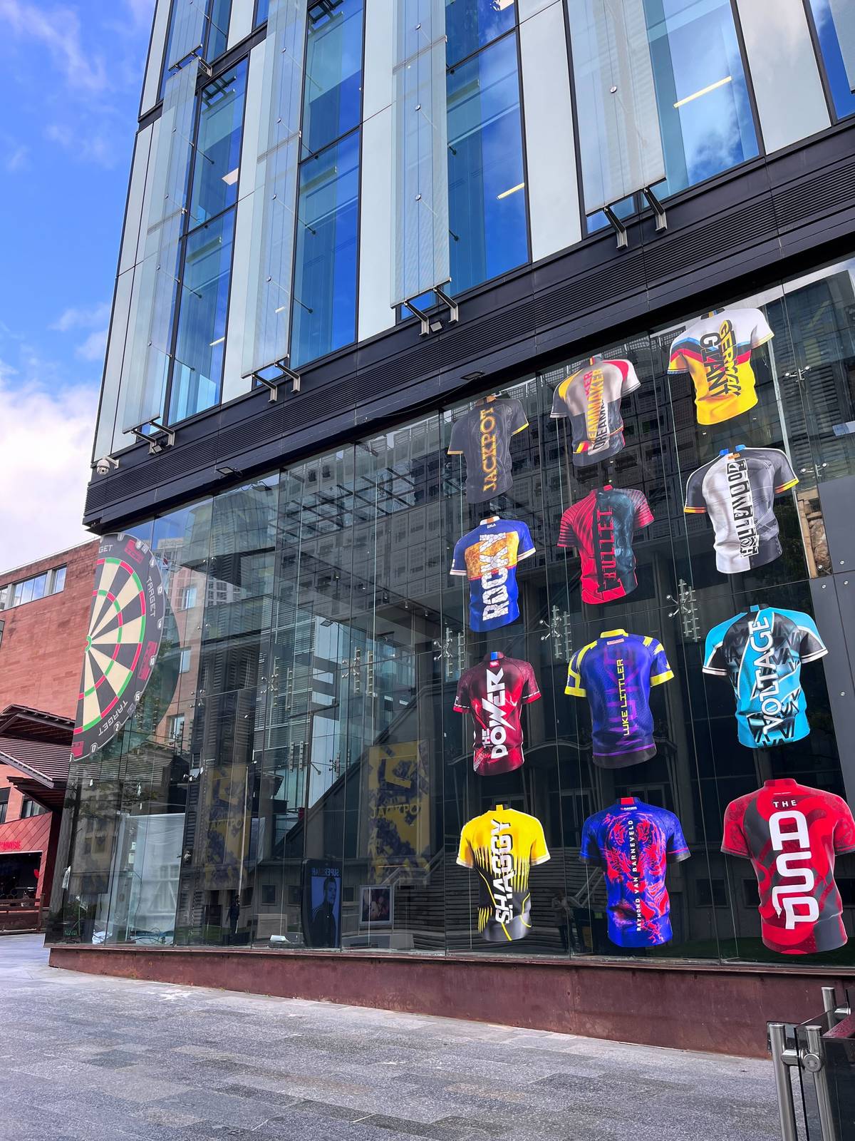 rows of shirts at target darts pop-up experience in spinningfields, manchester