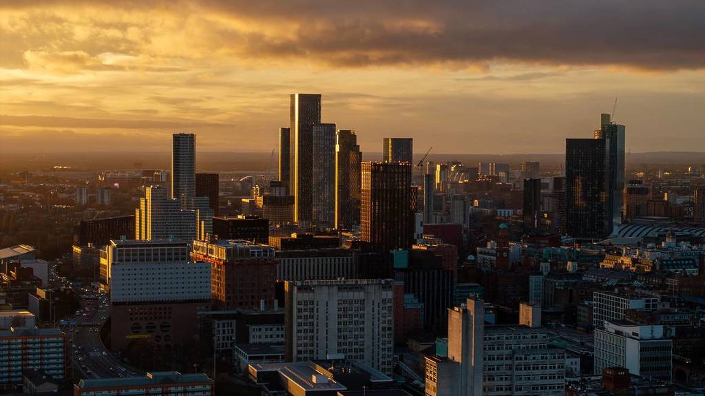 manchester skyline at sunset