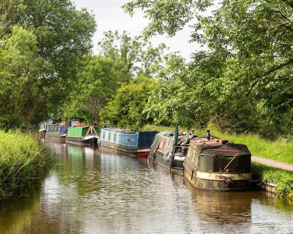 Narrowboats on the Peak Forest Canal, Furness Vale, Derbyshire, UK