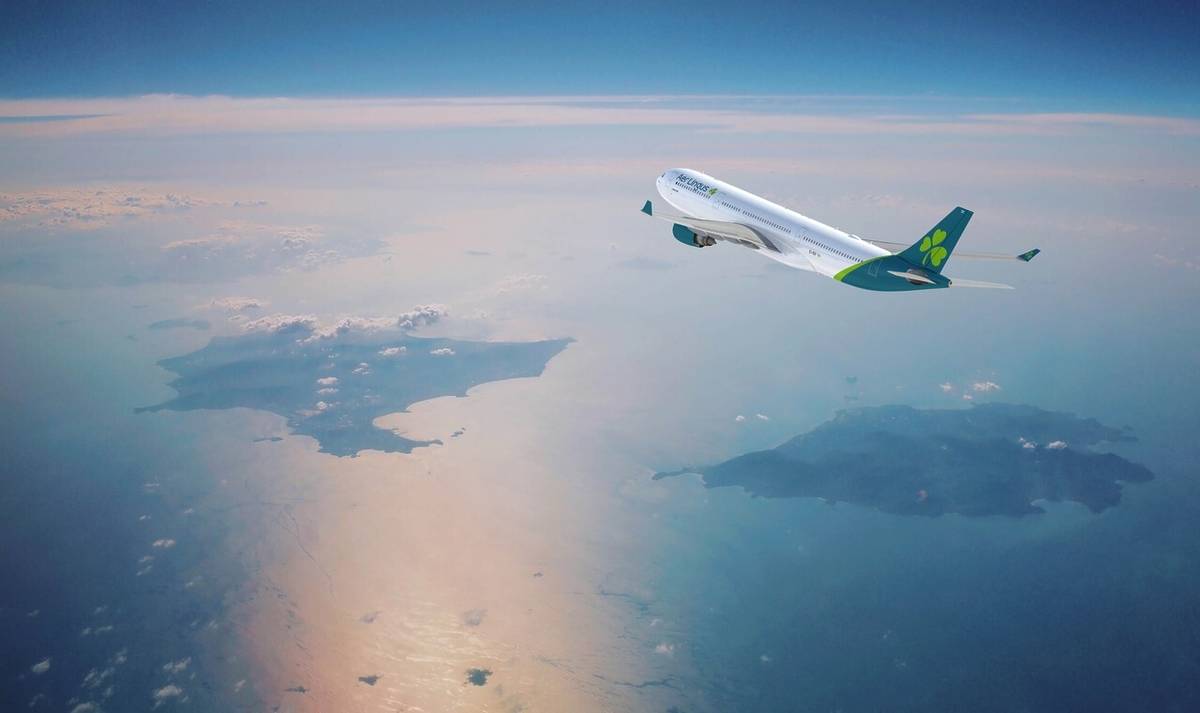 aer lingus A330 flying over sea and islands