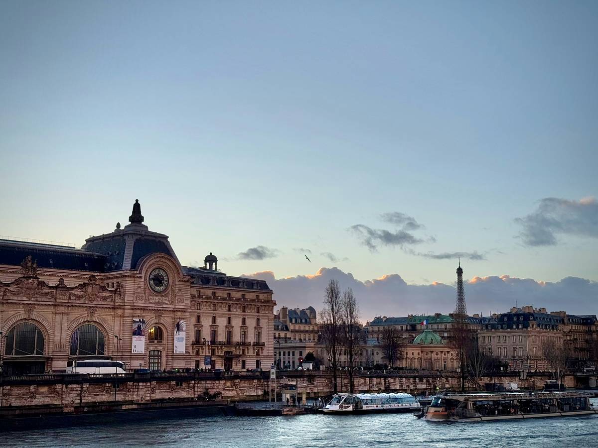 paris the seine river with musee d'orsay and eiffel tower