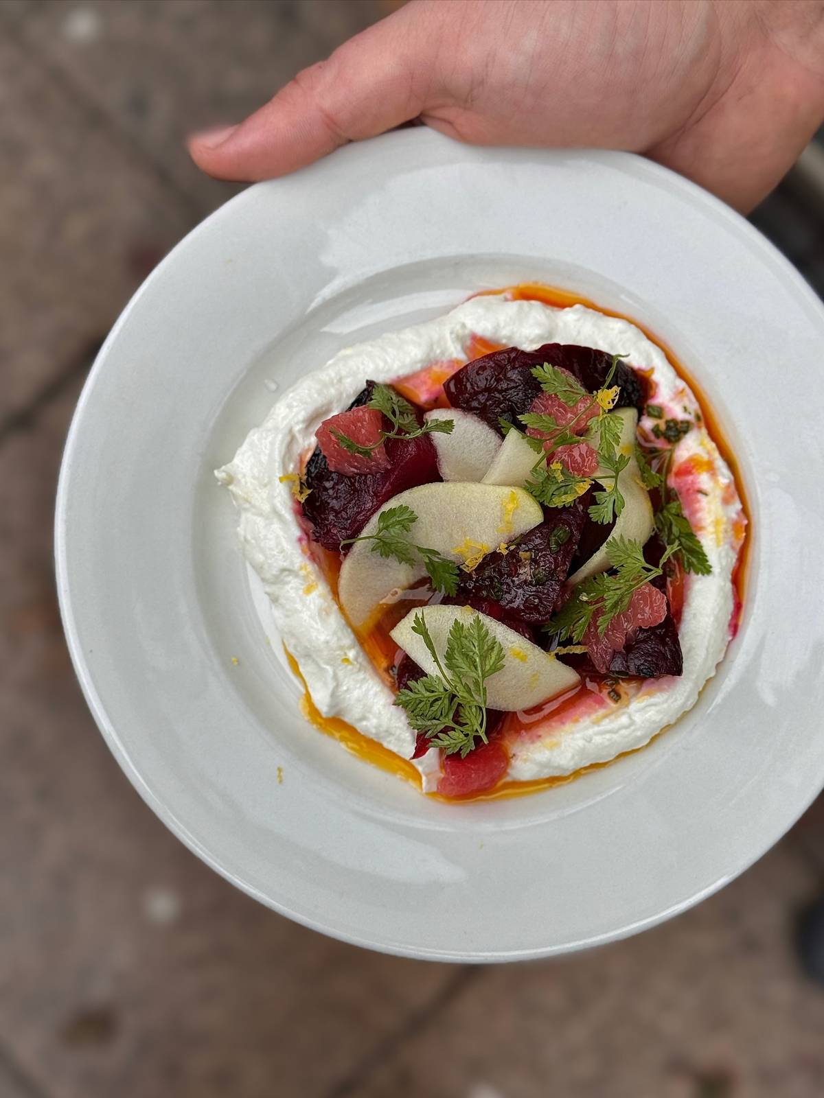 overnight beets with ricotta and apple on plate by stow manchester, one of the restaurants added to michelin guide in october 2025